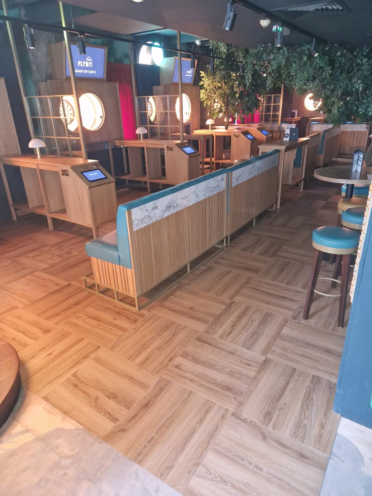 Parquet-pattern LVT through the booths and bar seating