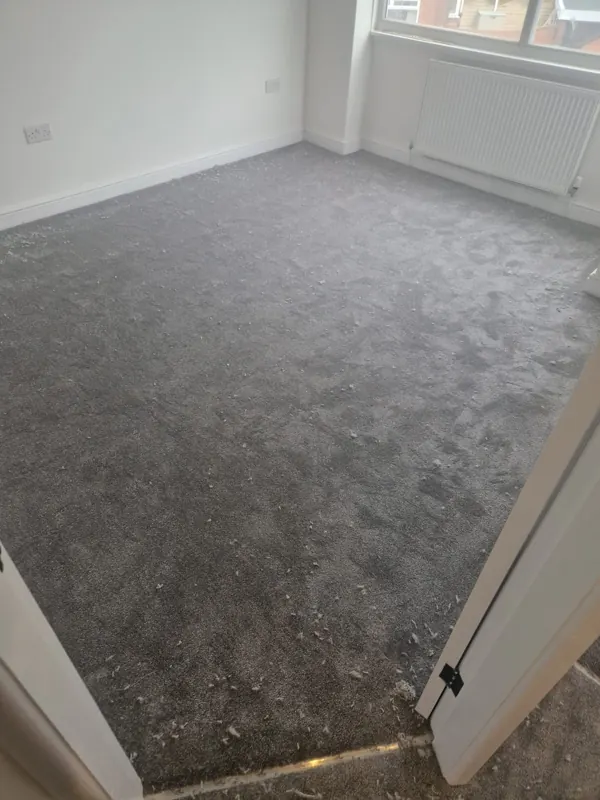 Grey carpet in a bedroom
