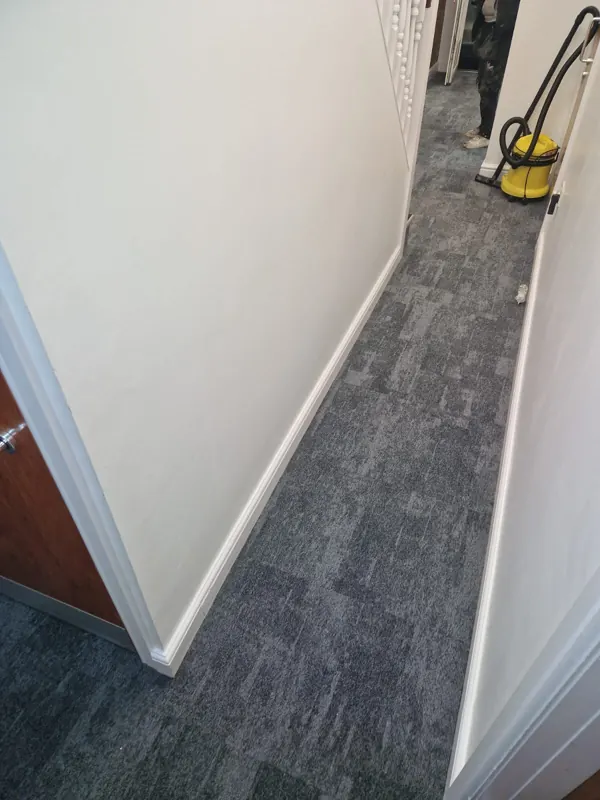 Carpet tiles along a corridor