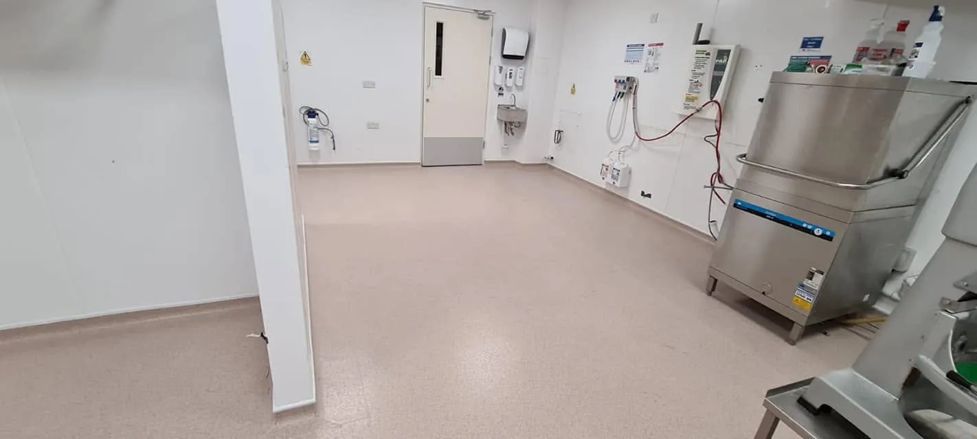 Kitchen in safety vinyl beside the dishwasher