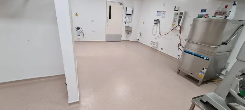 Kitchen in safety vinyl beside the dishwasher
