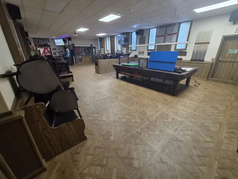 The finished games room in Polyflor Expona Versailles, with the snooker table back in place