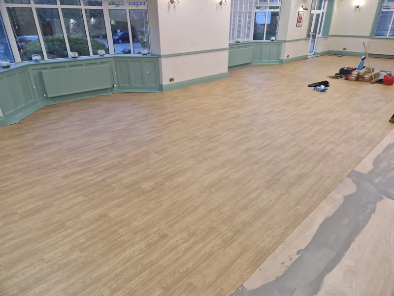 The finished function room in wood-effect plank LVT