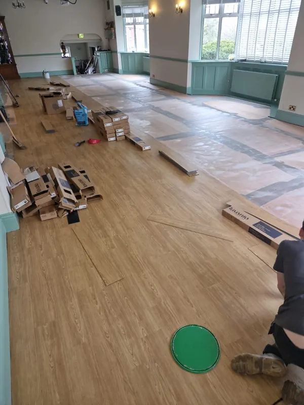 Old floor up and the new planks going down