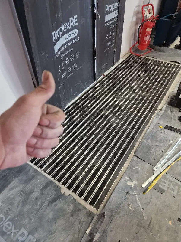 Recessed Gradus aluminium matting set into the station entrance