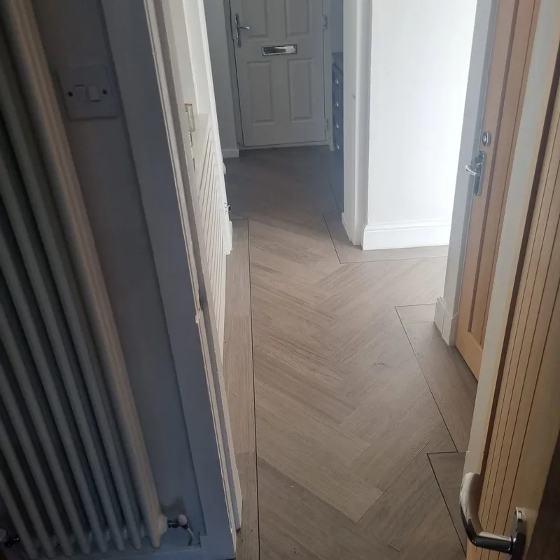 Border and herringbone meeting at the front door