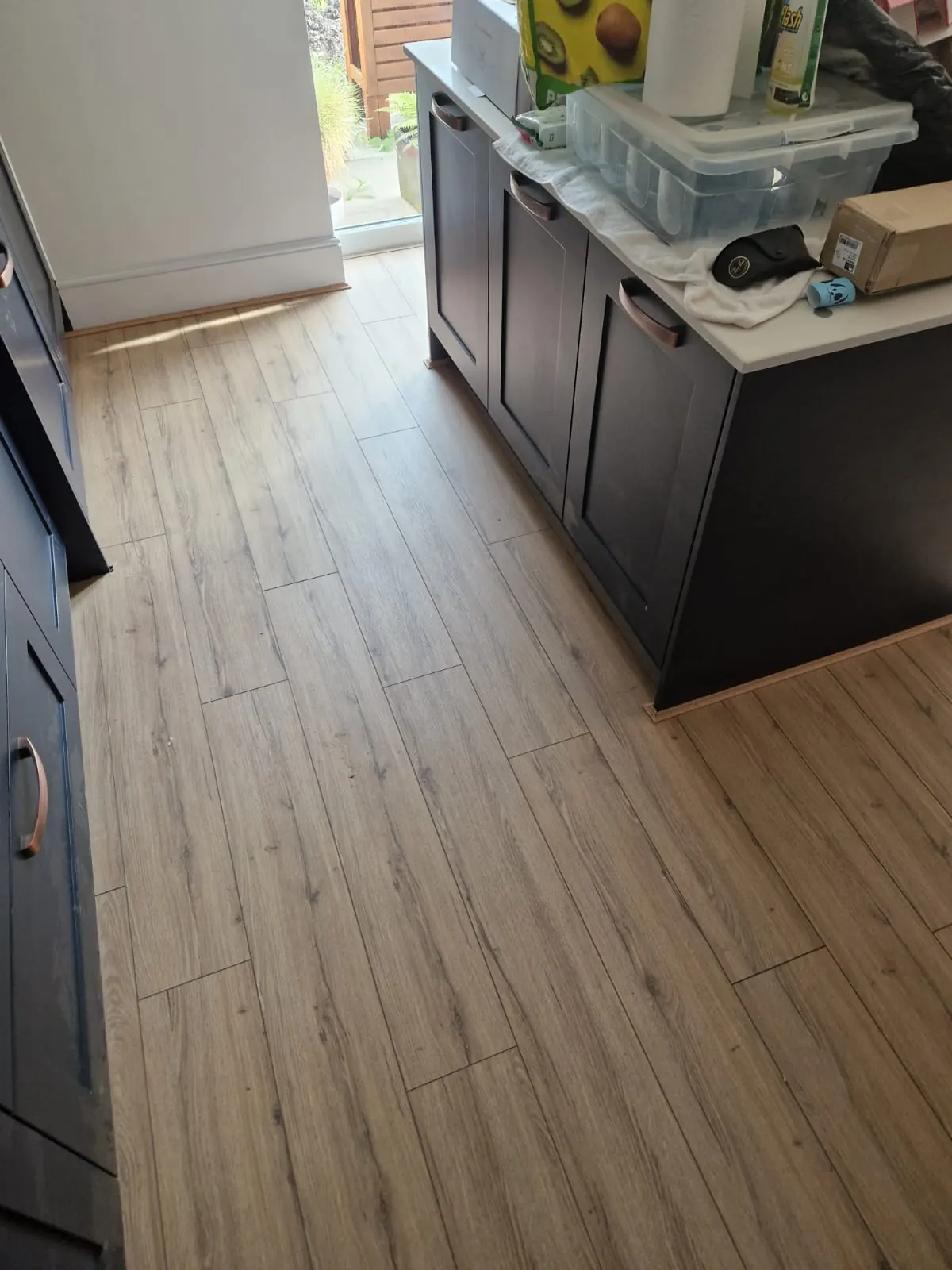 Wood-effect planks through the kitchen