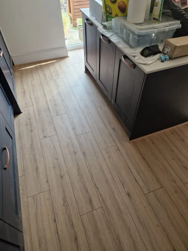 Wood-effect planks through the kitchen