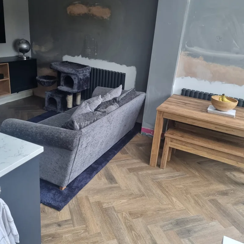 Herringbone floor through the lounge