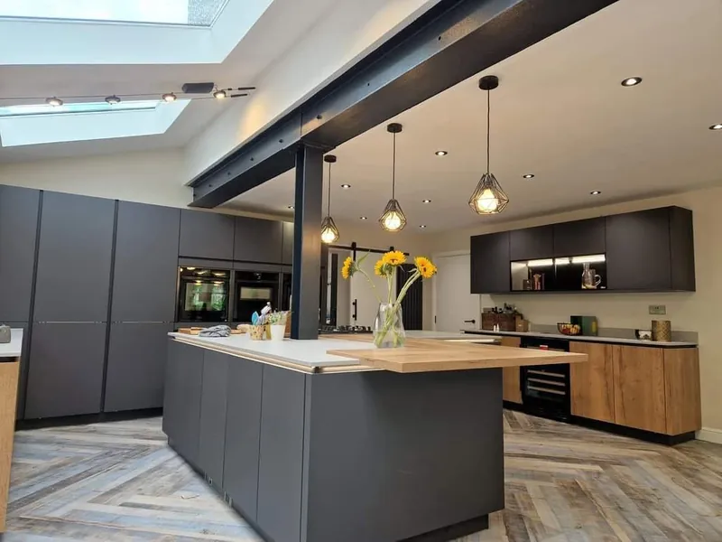 Herringbone LVT running under the pendant lights and island