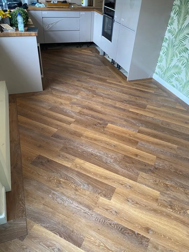The floor carried on into the kitchen