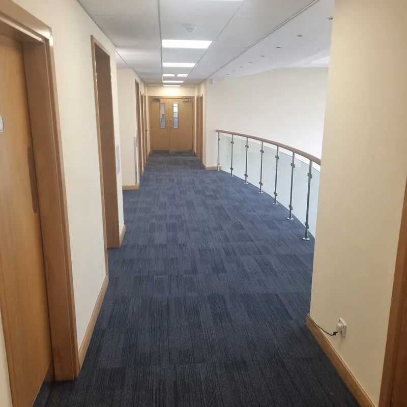 Carpet tiles through the corridor