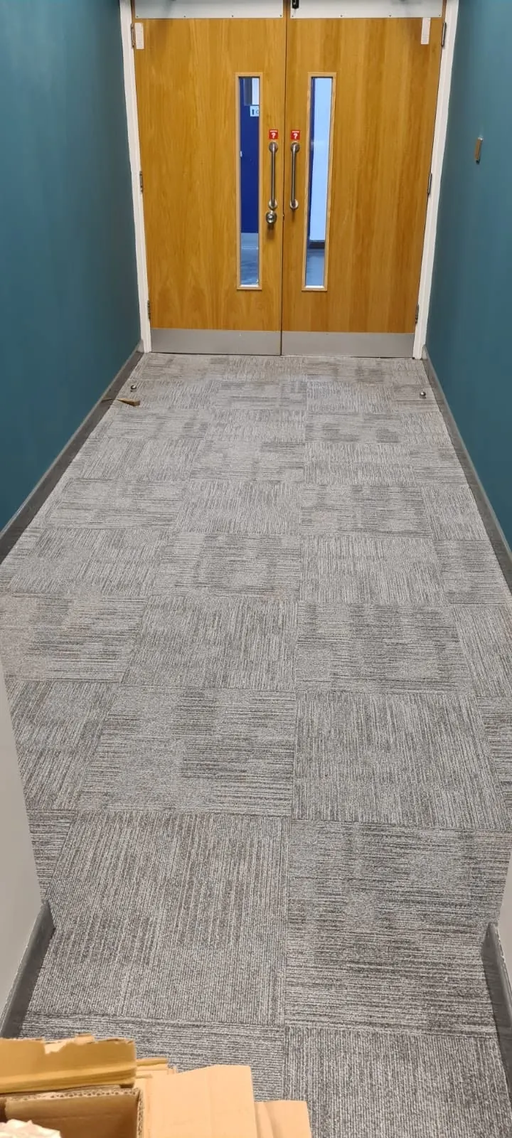 Corridor leading to the double doors