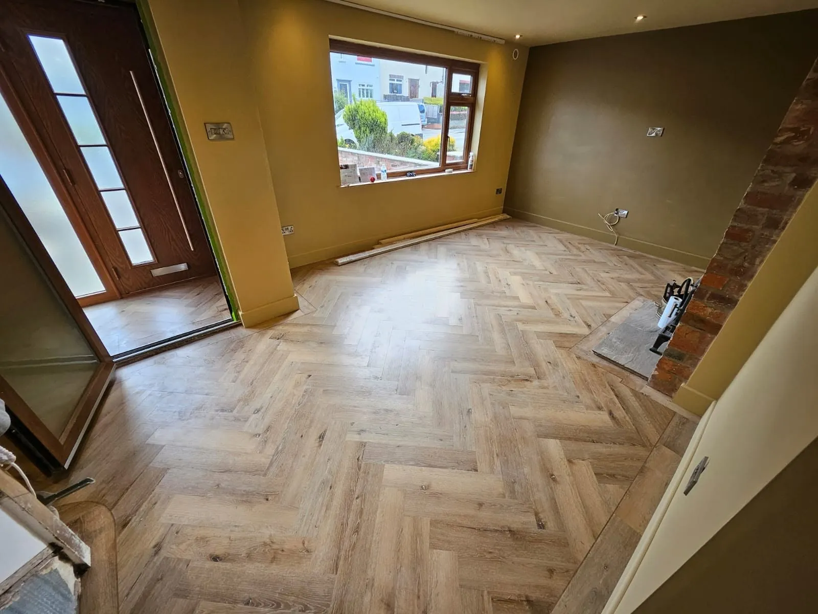 Herringbone LVT in the living area by the front window
