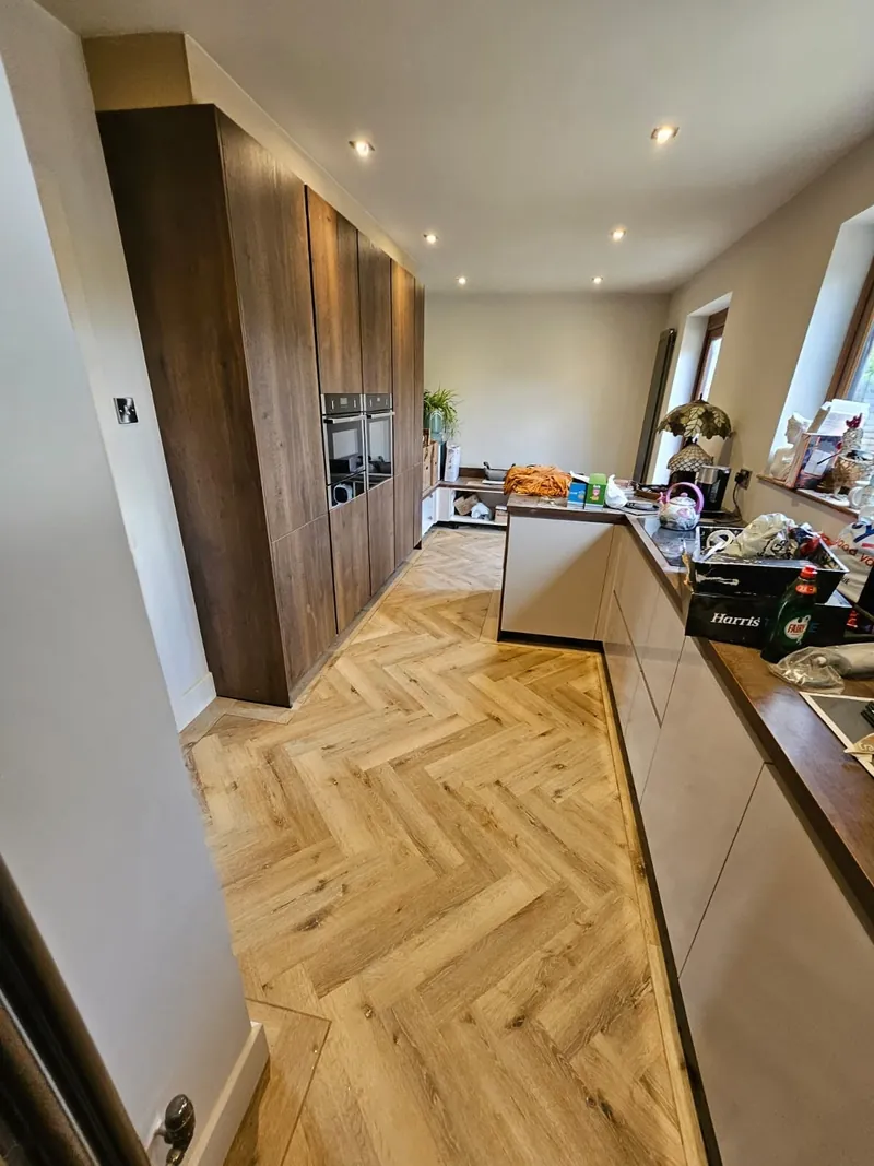 The kitchen end of the open-plan room