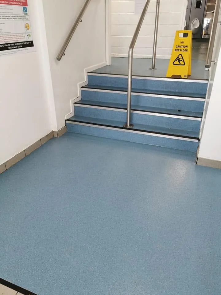 Safety vinyl on the lobby floor and steps